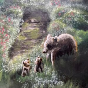 Mother bear and cubs in the forest